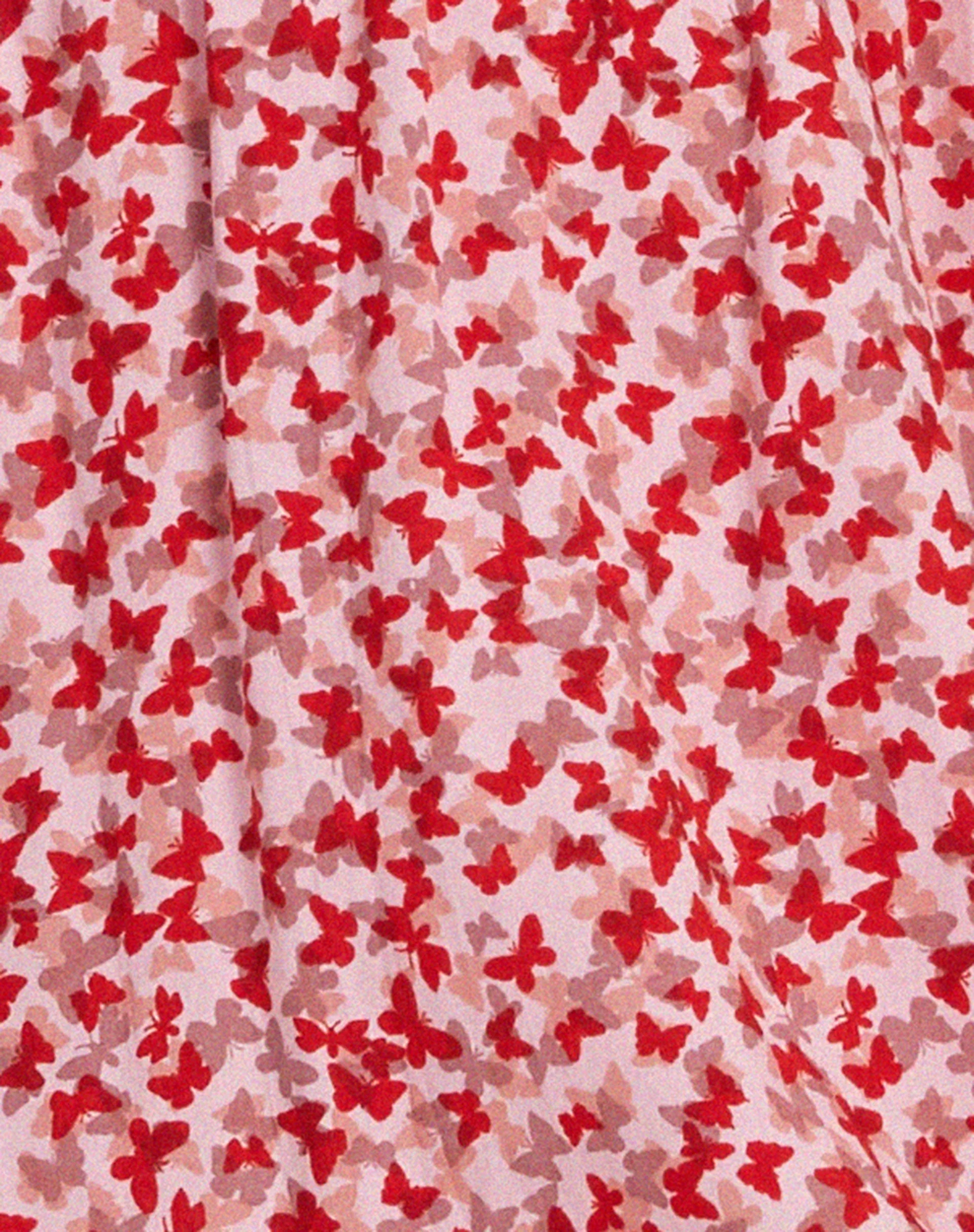 Galova Mini Dress in Ditsy Butterfly Peach and Red - Image 6