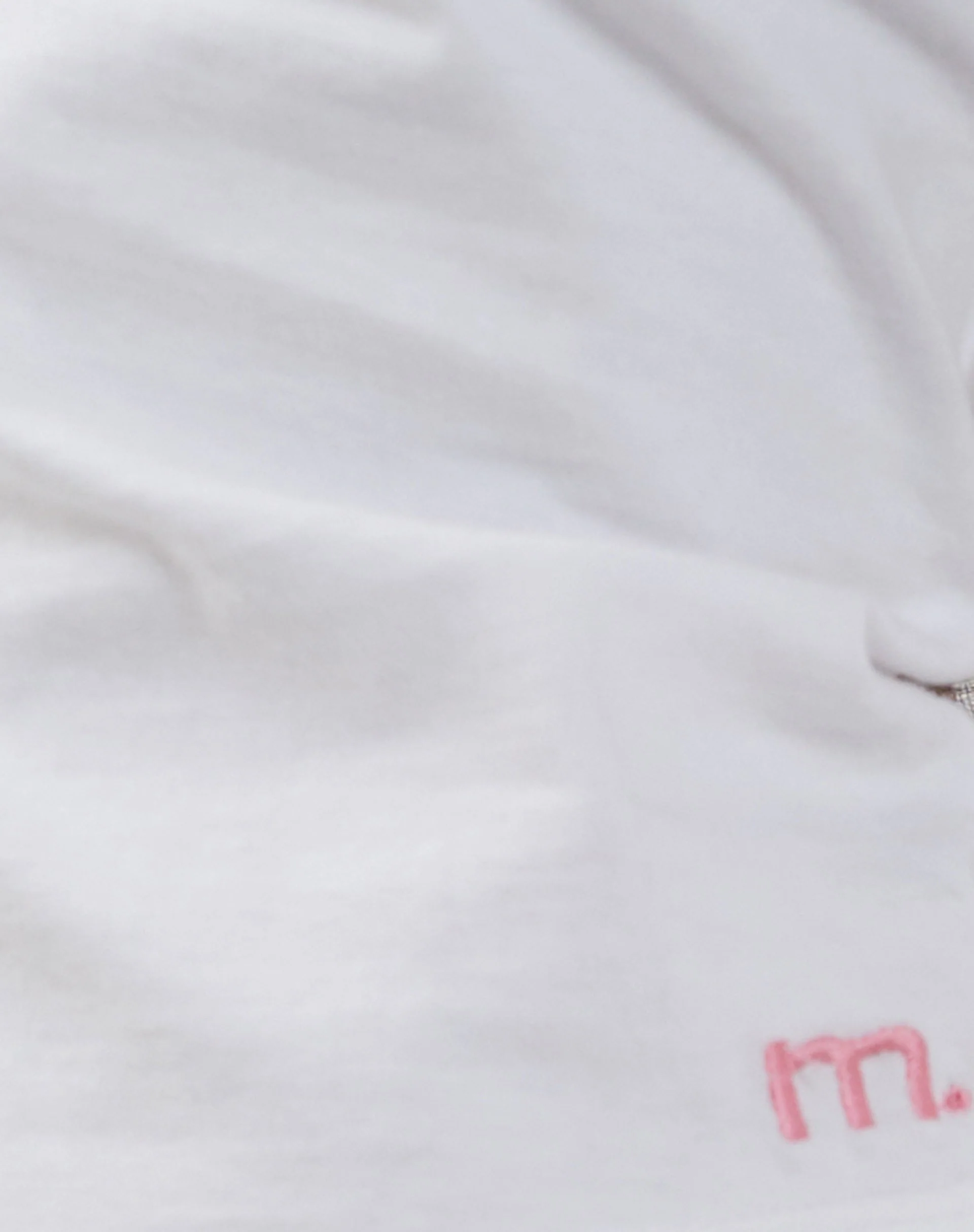 Izolde Baby Tee in White with Pink M Embroidery - Image 6