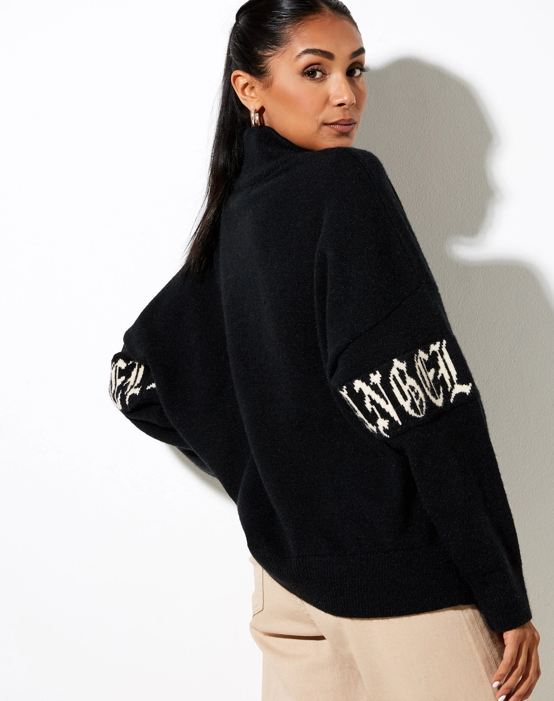 Tusca Sweatshirt in Black with Angel on Sleeve - Image 6