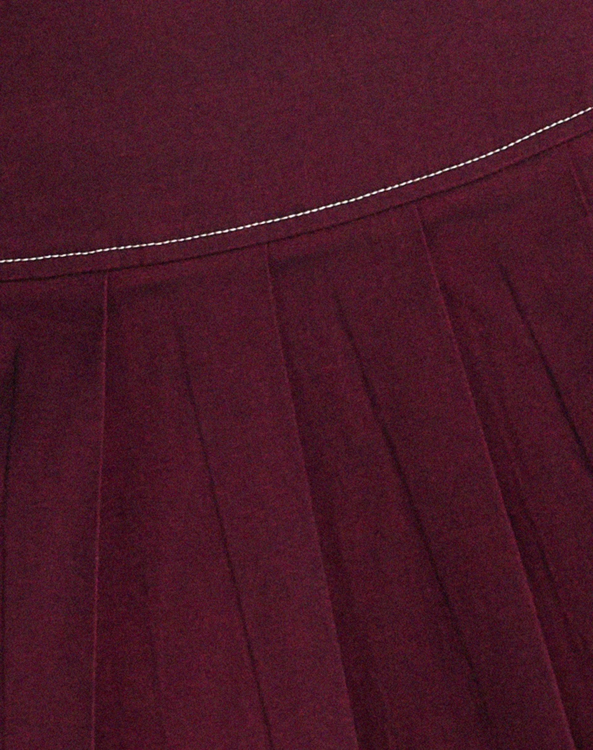 Zabini Low Rise Pleated Mini Skirt in Burgundy with Ecru Stitch Detail - Image 7